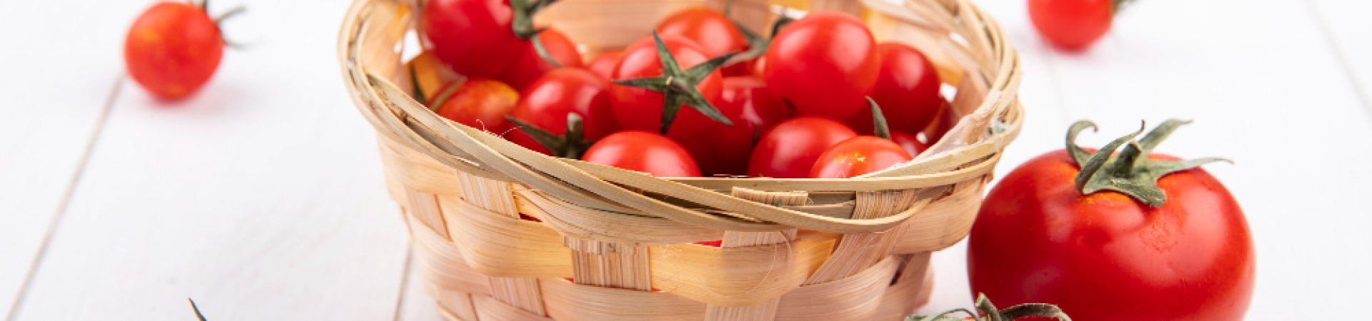 side-view-tomatoes-basket-wood